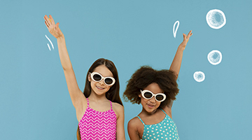 Two girls in swimsuits and sunglasses celebrating with bubble graphics, promoting the Jacuzzi Session