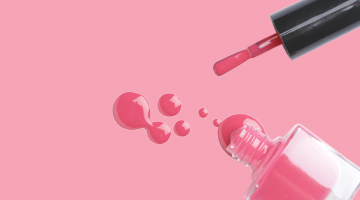 Pink nail polish bottle pouring polish with droplets, promoting the Nail Paint Only treatment